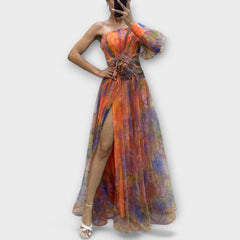 Elegant evening gown with one shoulder strap and fitted waist